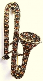 Elegantní brož - saxofon